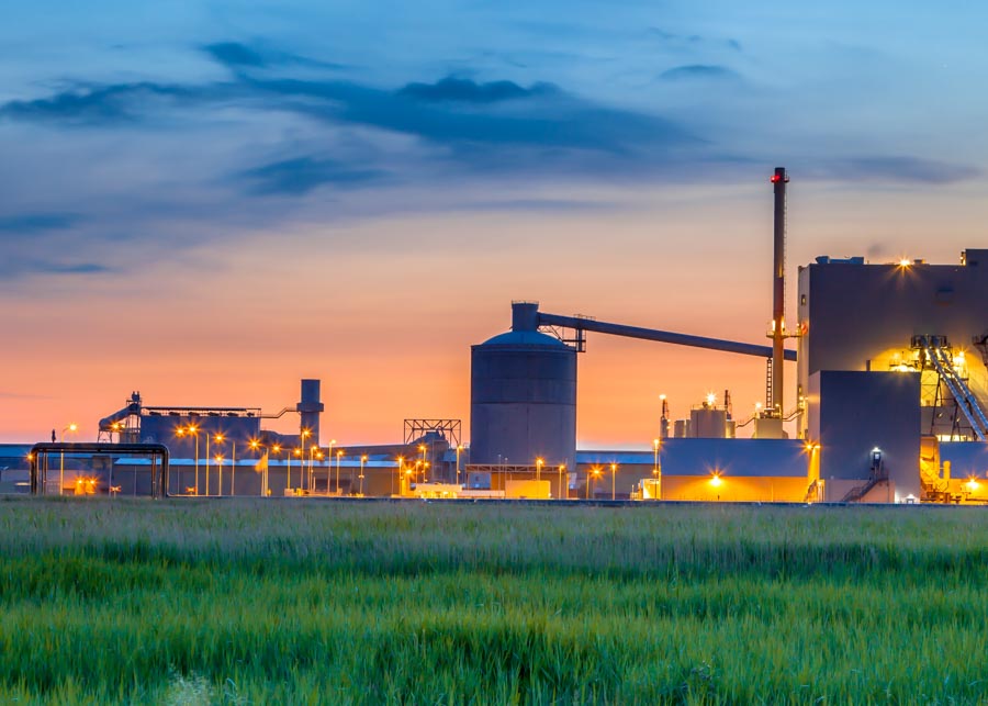 Part of a heavy Industrial Chemical area with surreal fantasy colors in twilight